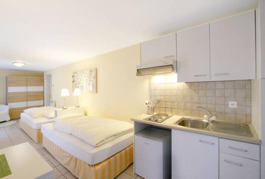 Depandance Garni Golf Apartment อัสโกนา ภายนอก รูปภาพ